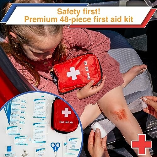 Child in car with scraped knee and first aid kit.